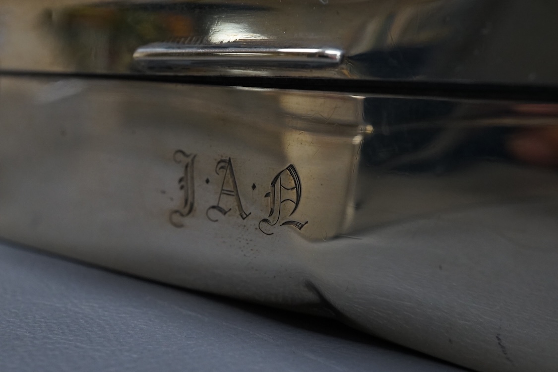 Three assorted silver mounted cigarette boxes, the largest by Frederick William Hentsch, London, 1924, 14.3cm.